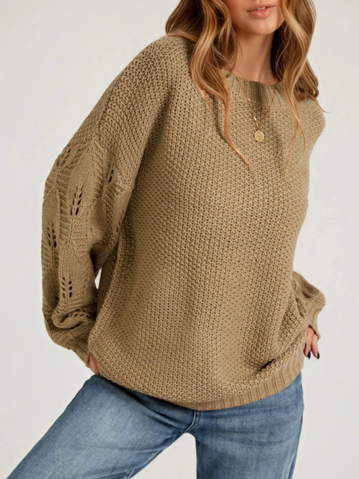 Openwork knit dropped shoulder sweater with curved hem
