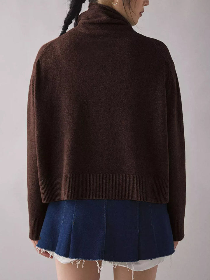 Turtleneck drop shoulder sweater with ribbed hem