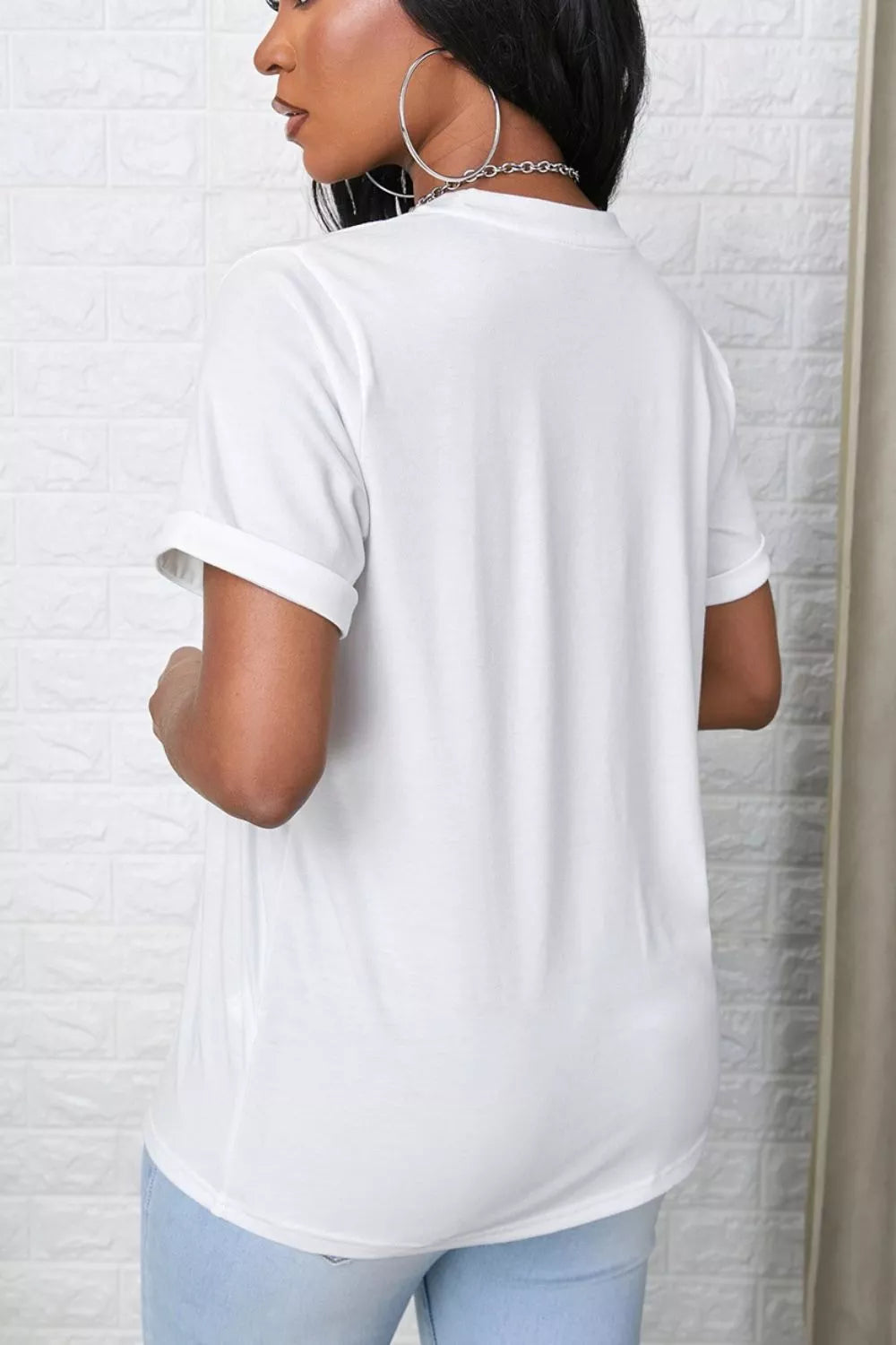 Rolled-sleeve crew neck tee with curved hem