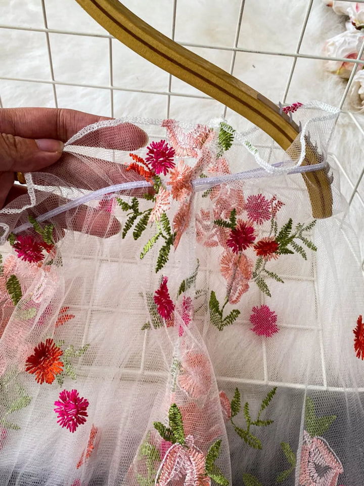 Floral embroidered off-shoulder mesh crop top with puff sleeves