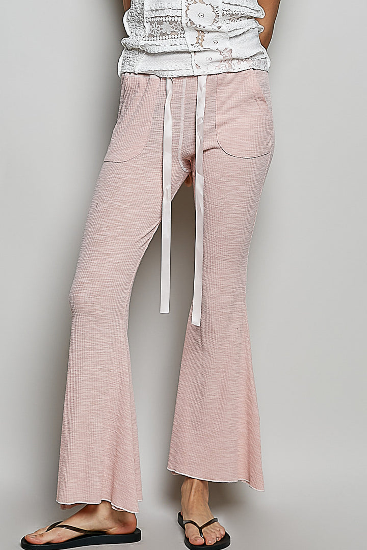 BLUSH PINK Textured ribbed knit flare pants with drawstring waist