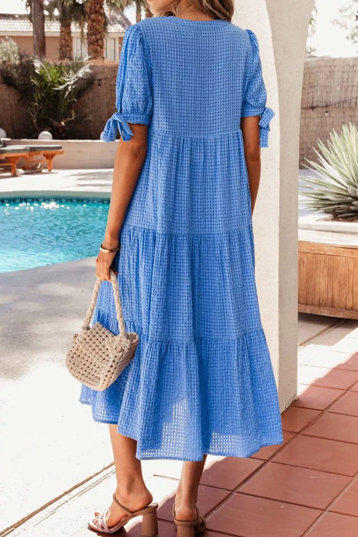 Tiered midi dress with notched neckline and tie sleeves