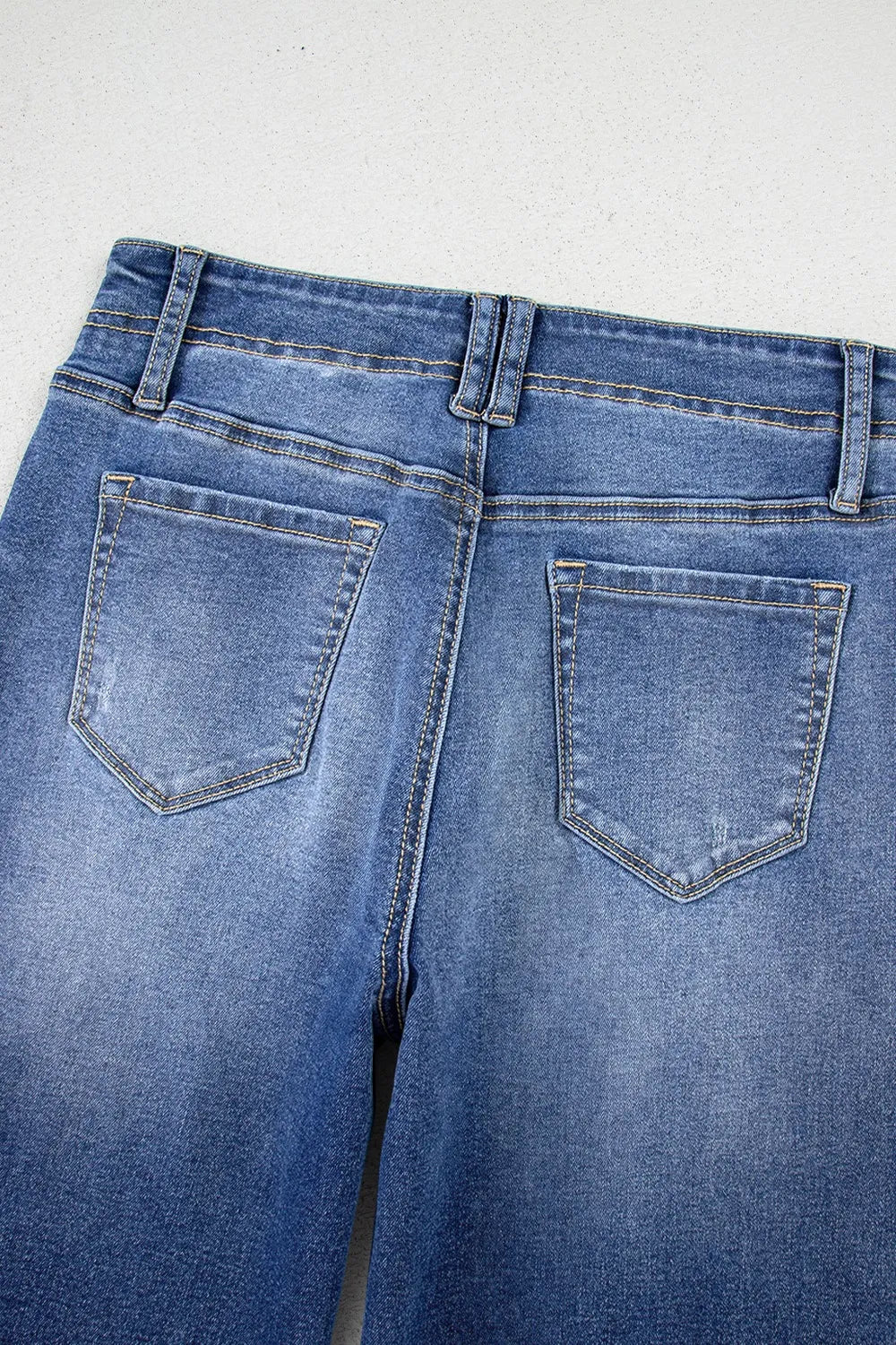 Vintage wash high-rise wide-leg jeans with patch pockets