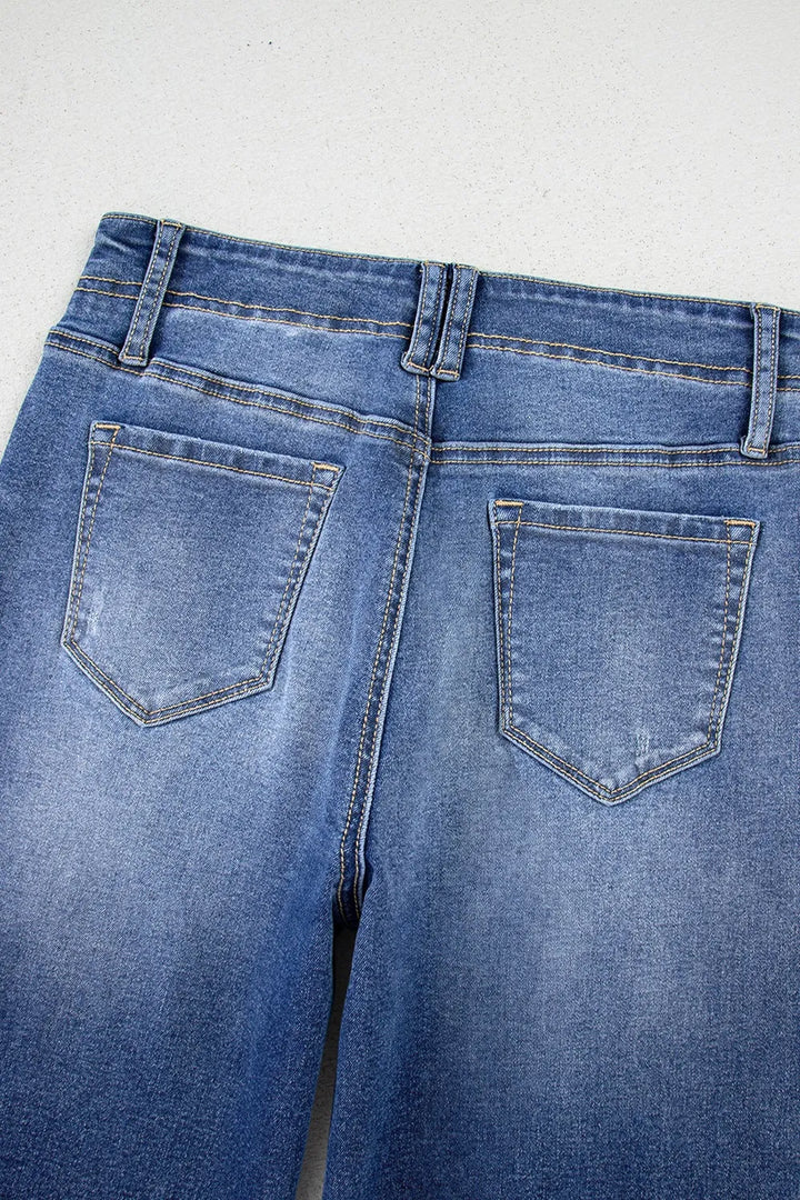 Vintage wash high-rise wide-leg jeans with patch pockets