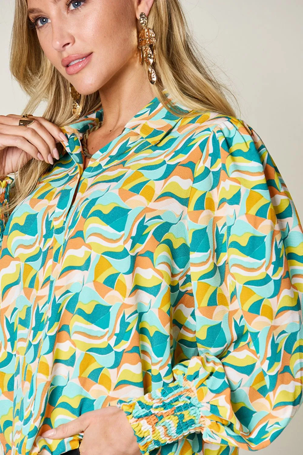 Abstract print smocked balloon sleeve blouse