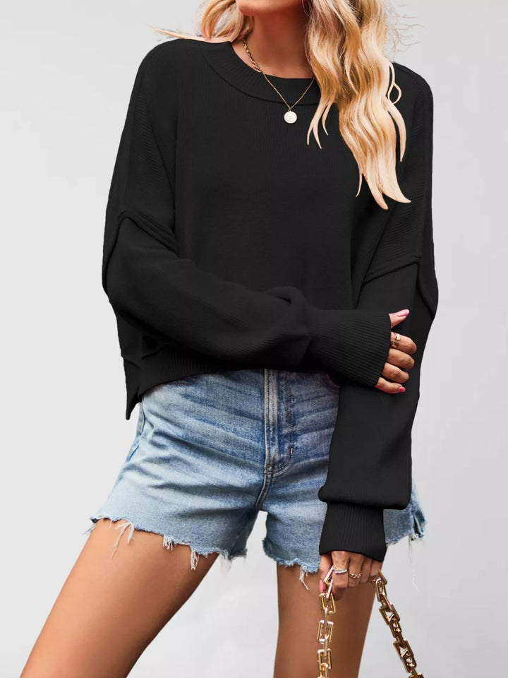 Black Dropped shoulder crew neck sweater with ribbed raw hem