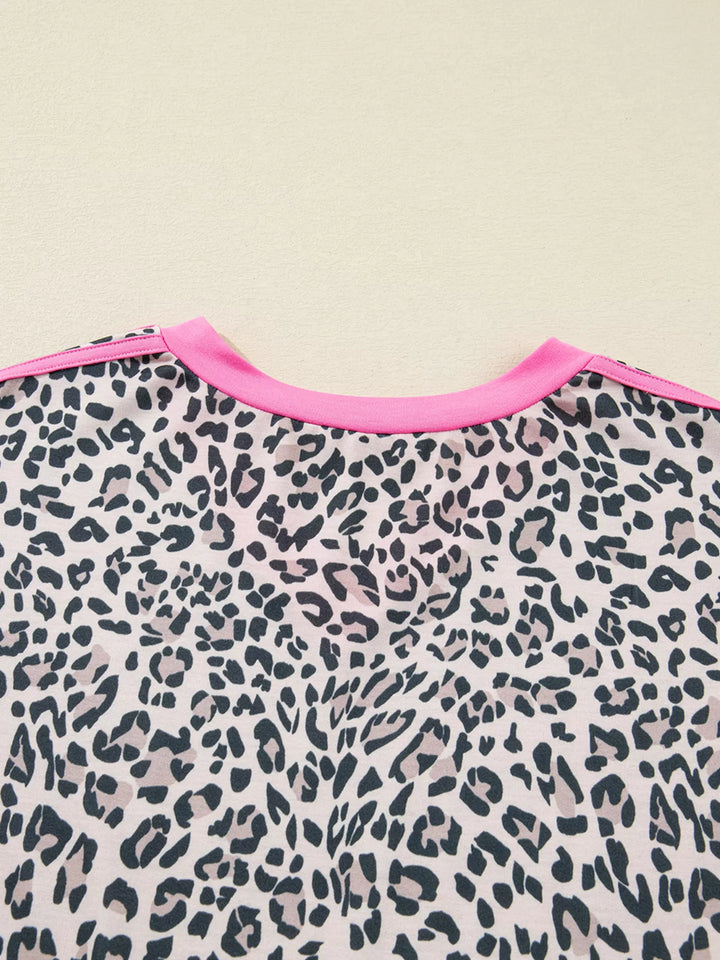 Leopard print long sleeve top with contrast V-neck trim