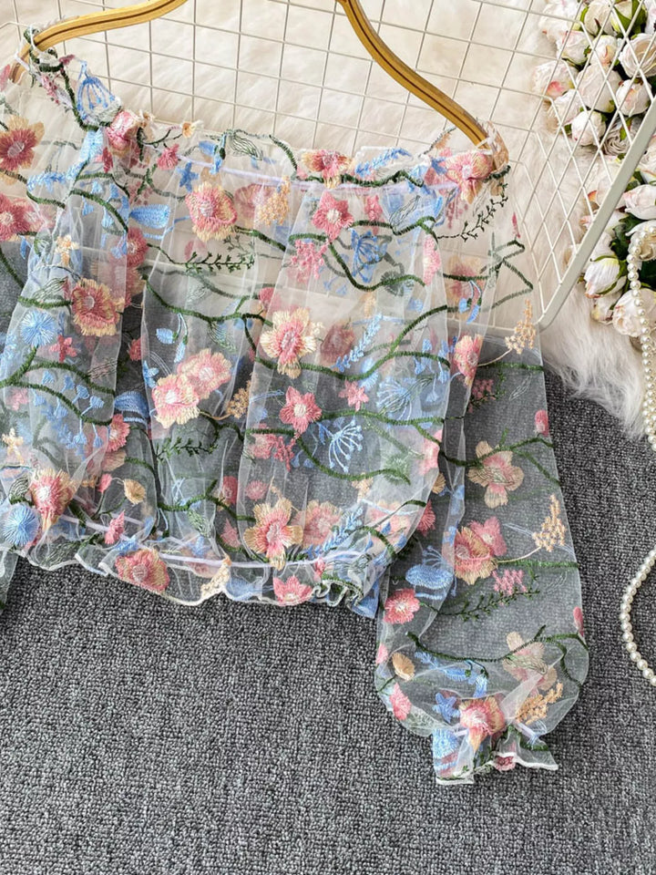 Floral embroidered off-shoulder mesh crop top with puff sleeves