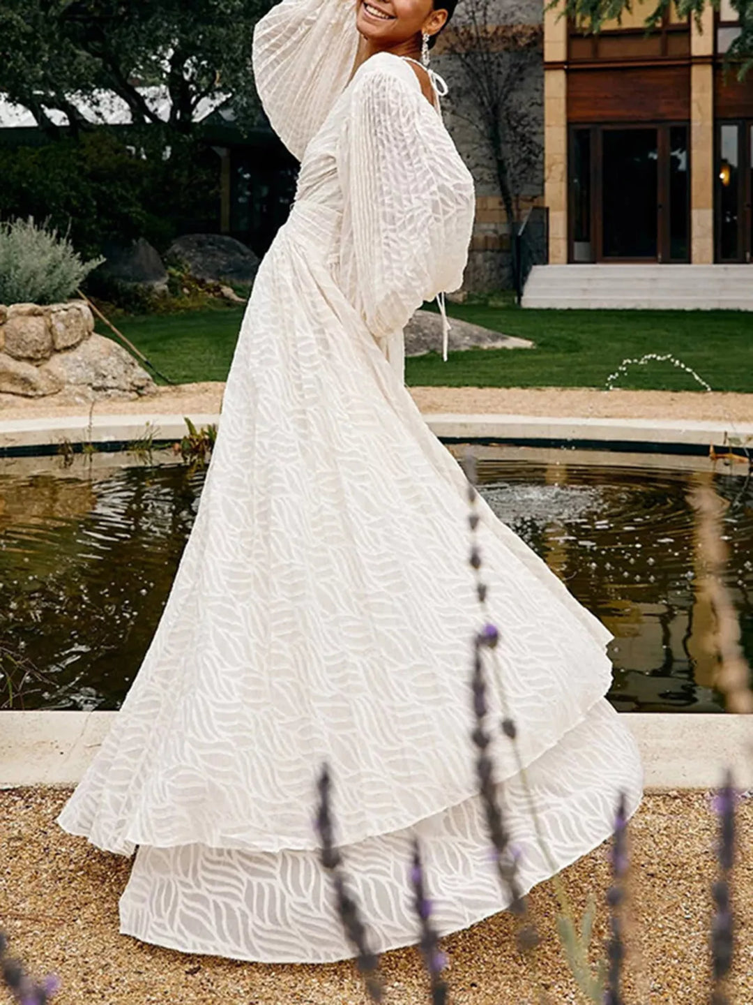 Textured V-neck balloon sleeve maxi dress with twist front