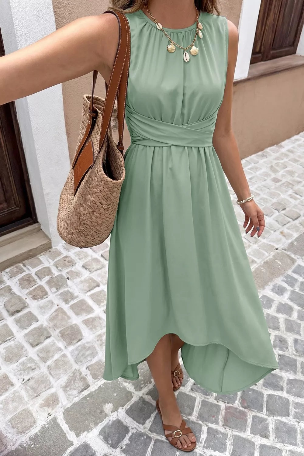 Sleeveless twist-front high-low A-line midi dress