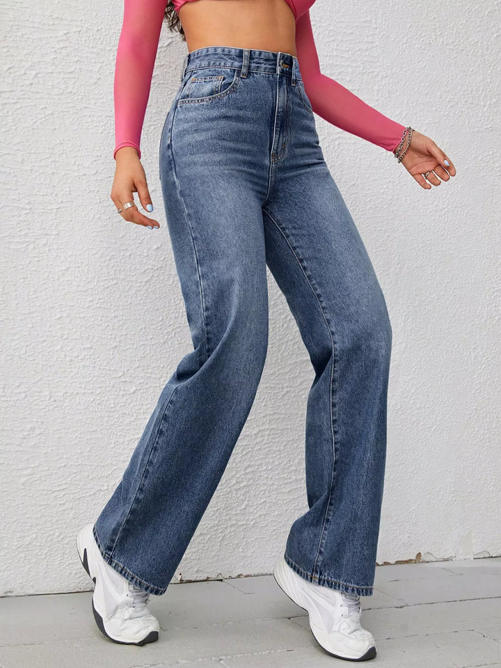 High-rise wide-leg washed jeans with whiskering