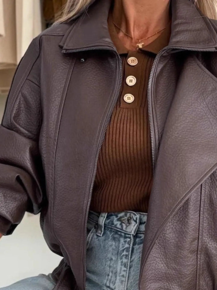Oversized faux leather moto jacket with belted hem