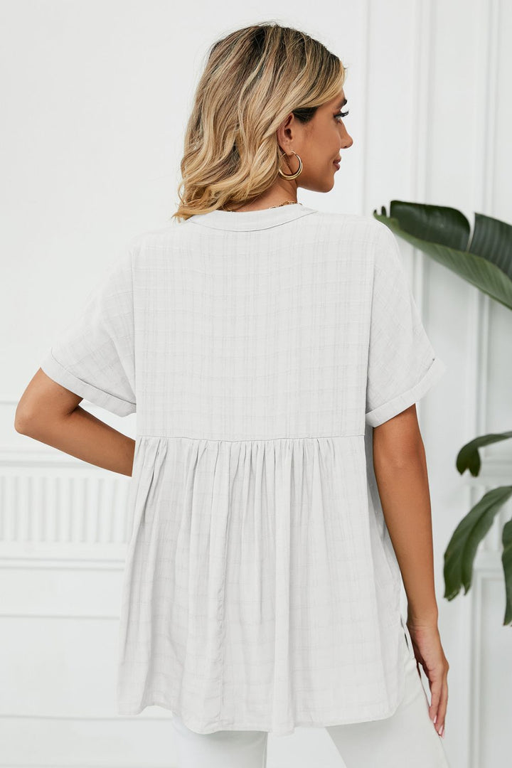 Notched neck cuffed short sleeve blouse with side slits
