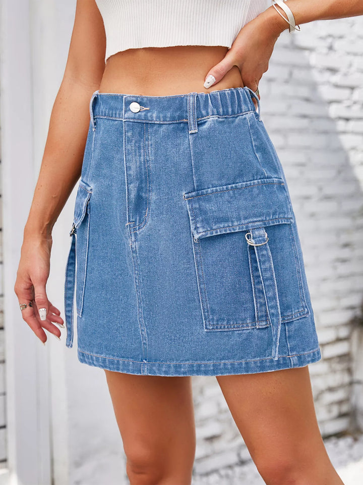 Cargo denim mini skirt with flap pockets and D-rings