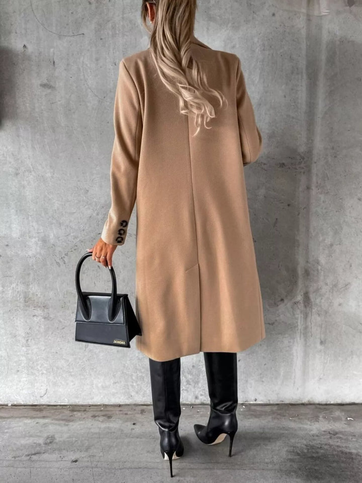 Double-breasted longline coat with notch lapel and flap pockets