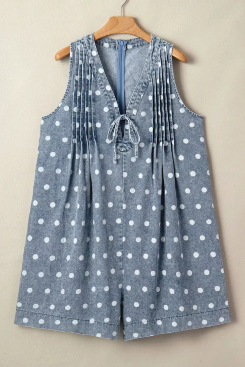 Pintucked polka dot denim romper with tie V-neck