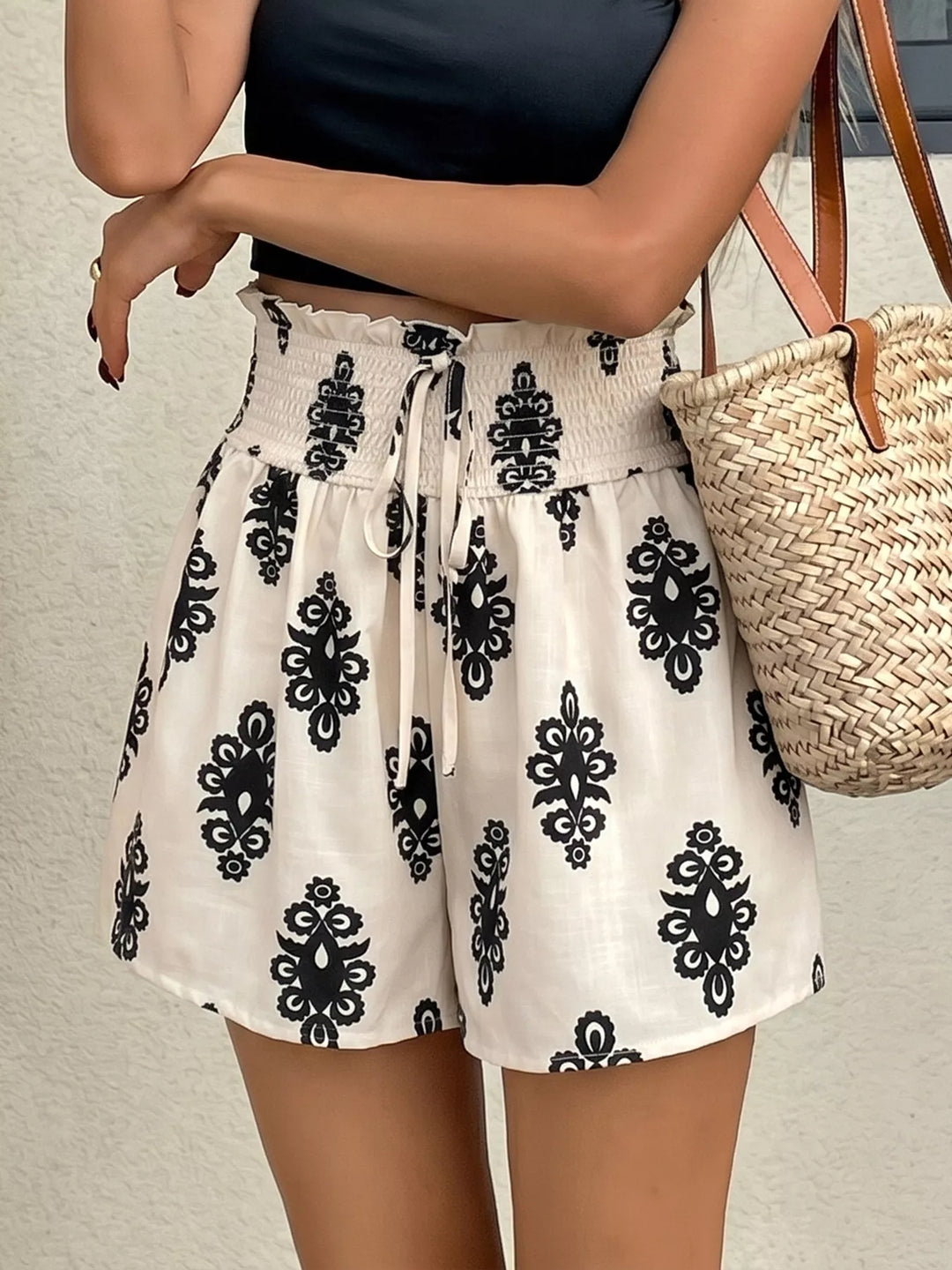 Smocked high-rise shorts with medallion print and tie waist