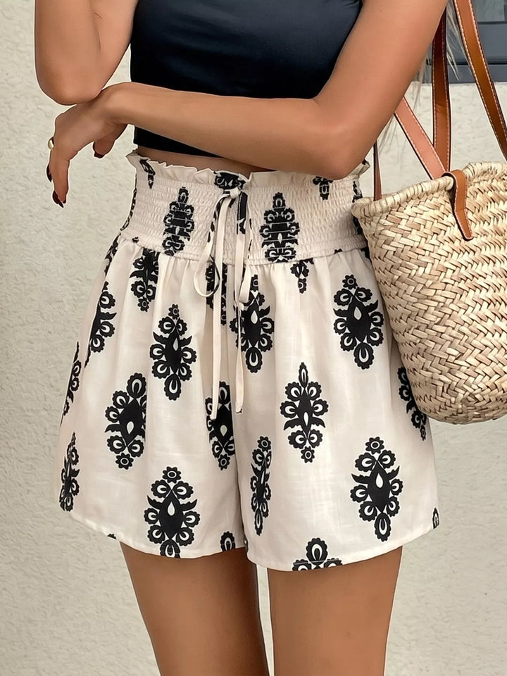 Smocked high-rise shorts with medallion print and tie waist