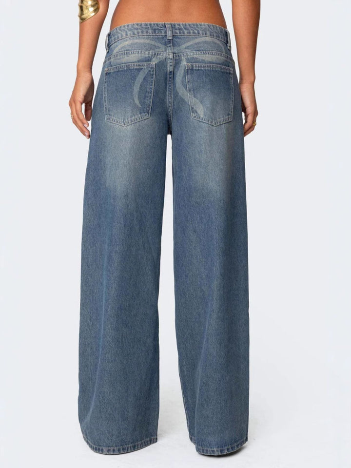Vintage wash wide-leg jeans with whiskered fading