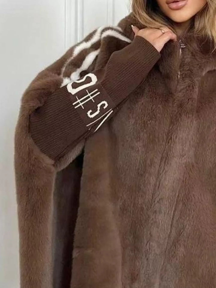 Hooded faux fur coat with striped trim and knit sleeves