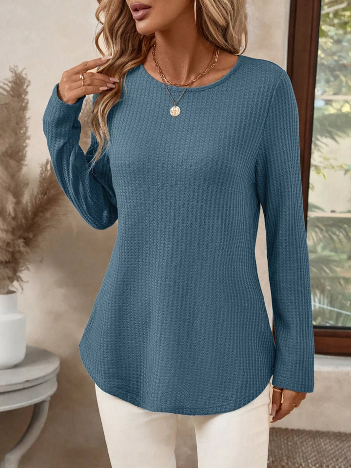 Waffle knit crew neck long sleeve top with curved hem