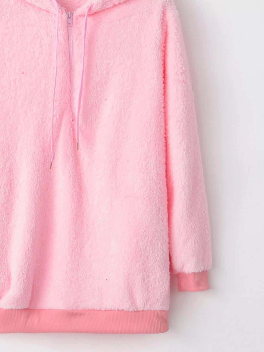 Plush half-zip fleece hoodie with drawstring hood and pockets