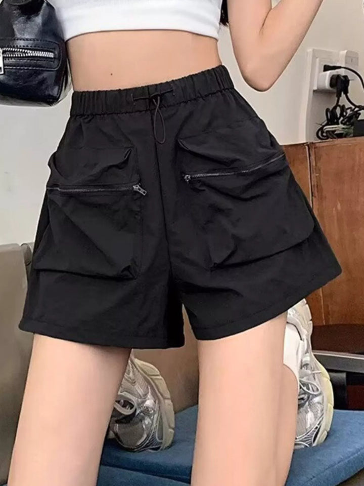 High-rise cargo shorts with zip pockets and drawstring waist