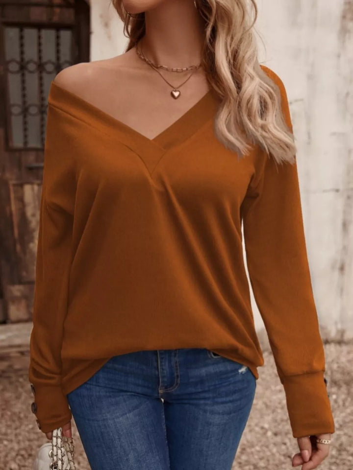 V-neck long sleeve top with button cuffs