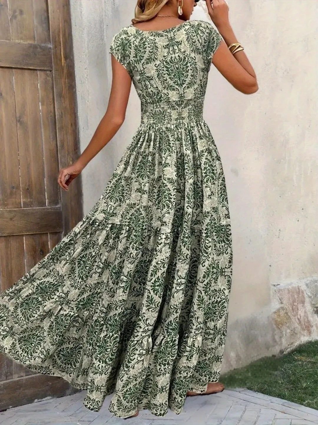 Smocked tiered maxi dress with cap sleeves and side slit