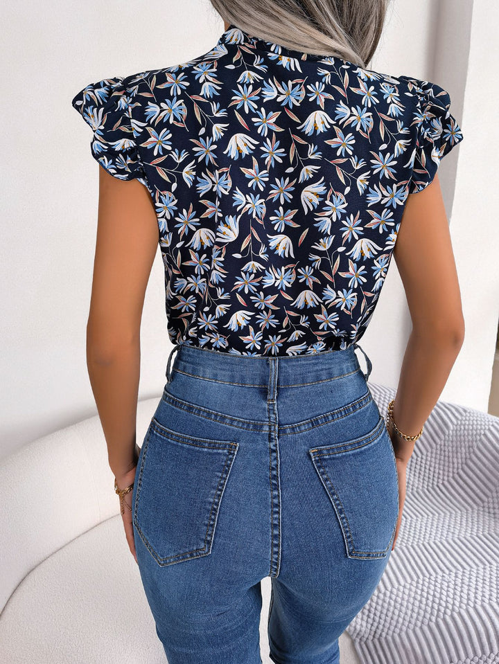 Floral tie-neck blouse with ruffled flutter sleeves