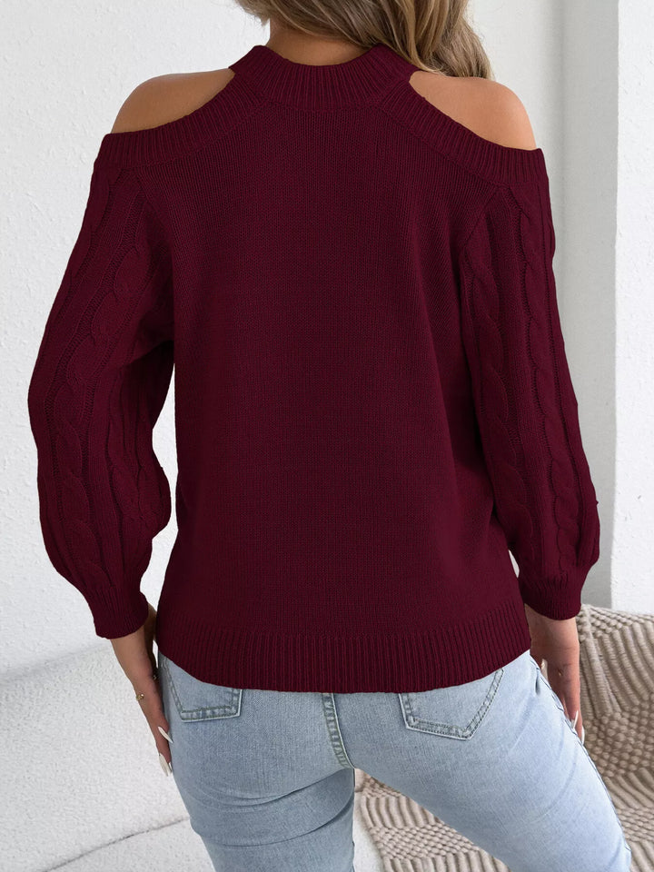 Cold shoulder cable knit mock neck sweater