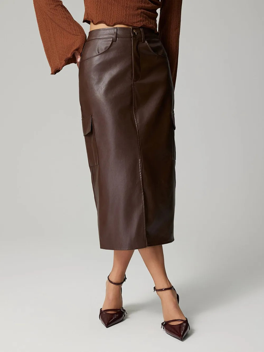 High-rise faux leather midi skirt with cargo pockets and slit