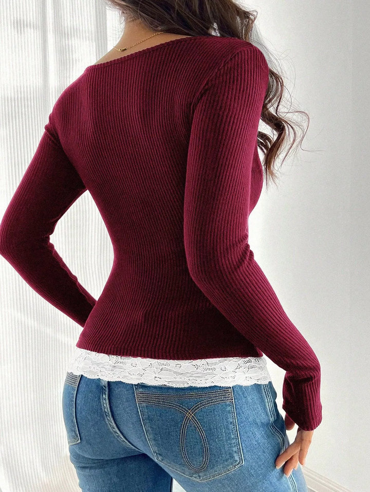 Ribbed knit long sleeve top with lace trim and button placket
