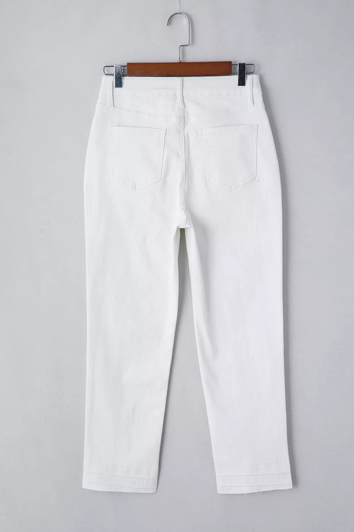 High-rise straight leg jeans with released hem