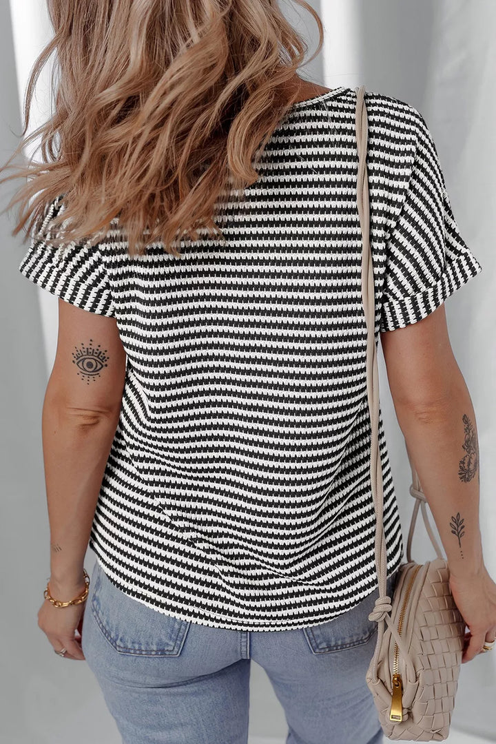 Striped textured knit top with notched V-neck and cuffed sleeves