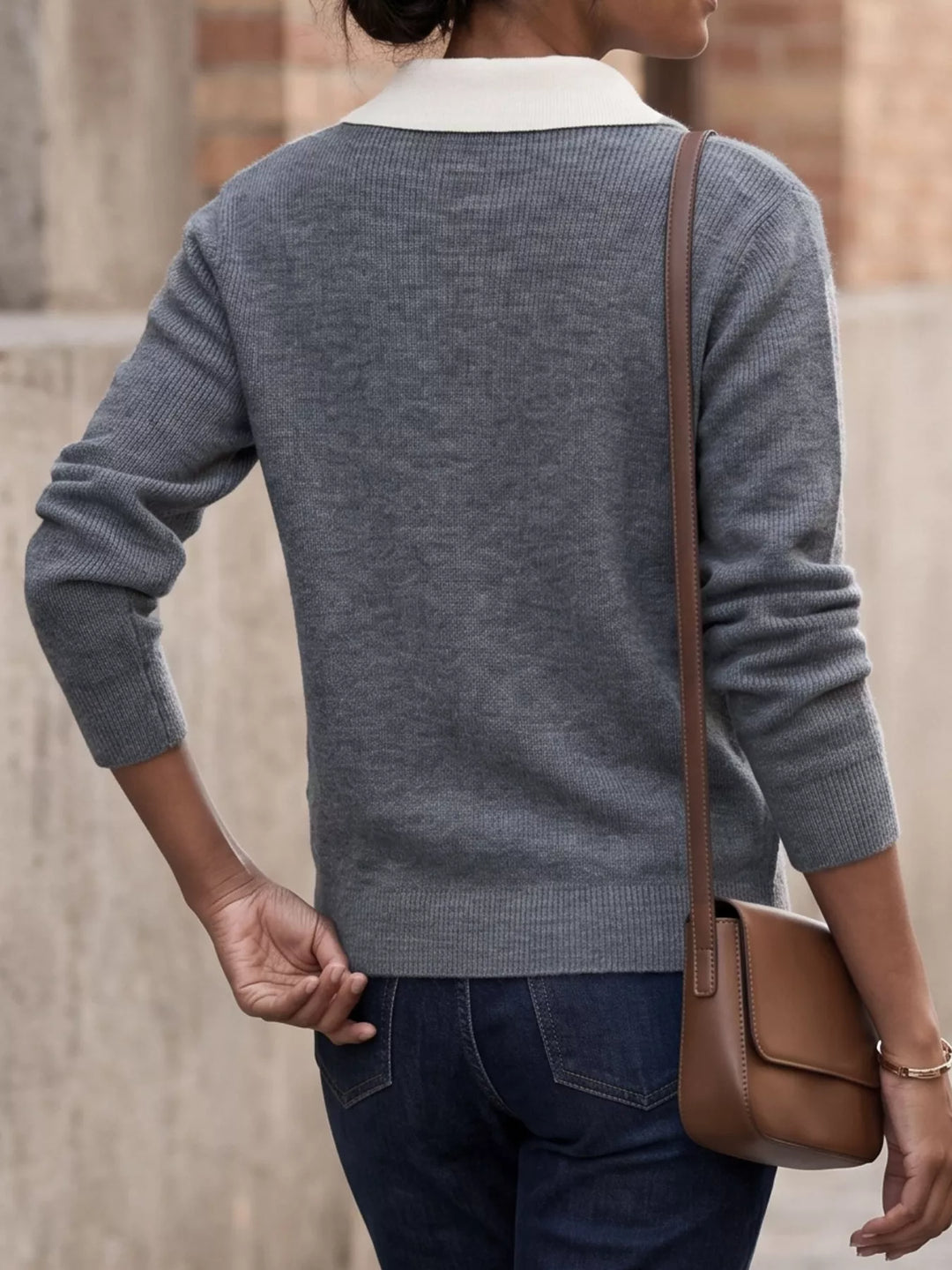 Contrast collar quarter zip knit sweater with ribbed hem