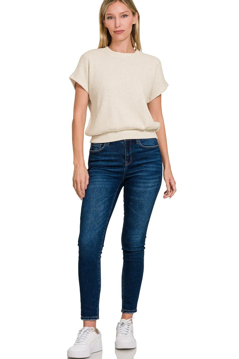 Waffle knit short sleeve sweater with banded hem
