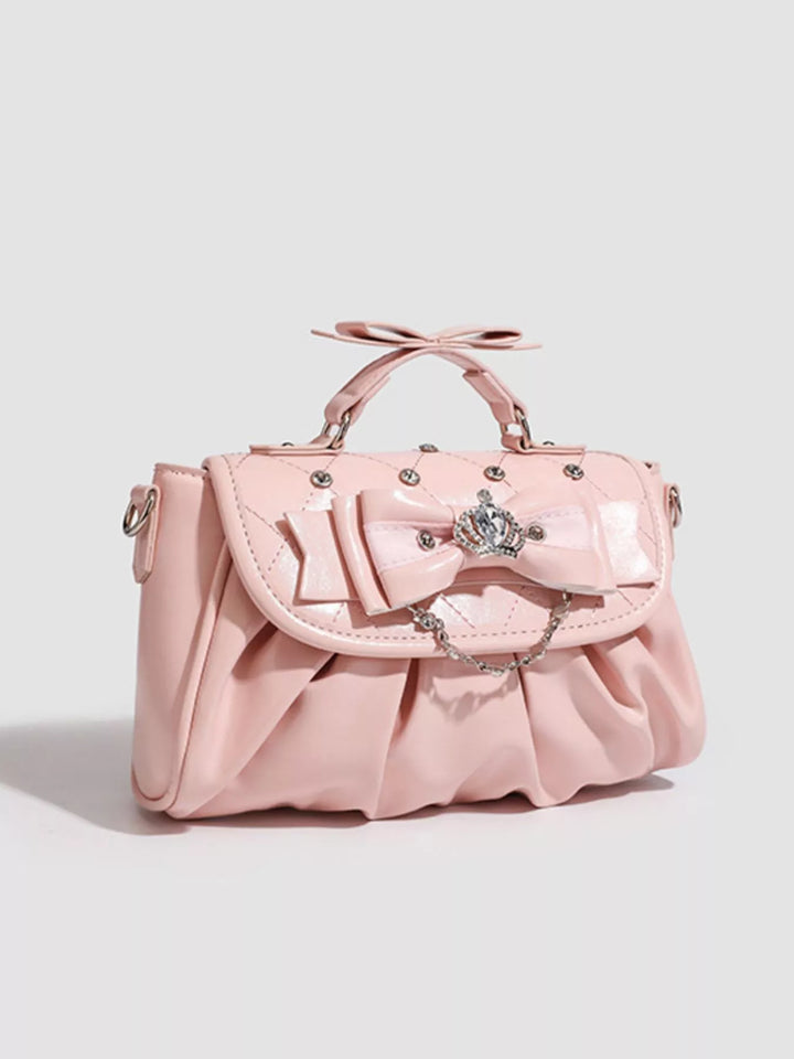 Ruched bow crossbody bag with rhinestone chain strap