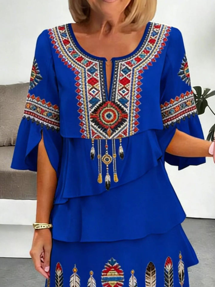 Tribal print tiered ruffle mini dress with notched neckline