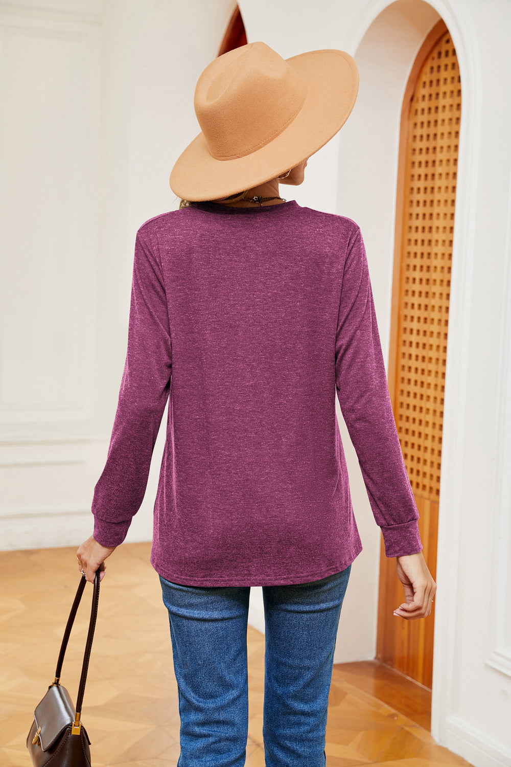 Notch neck long sleeve top with button placket