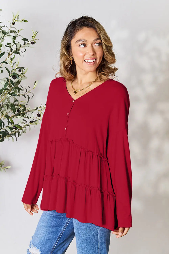 Burgundy Half-button long sleeve blouse with tiered ruffle hem