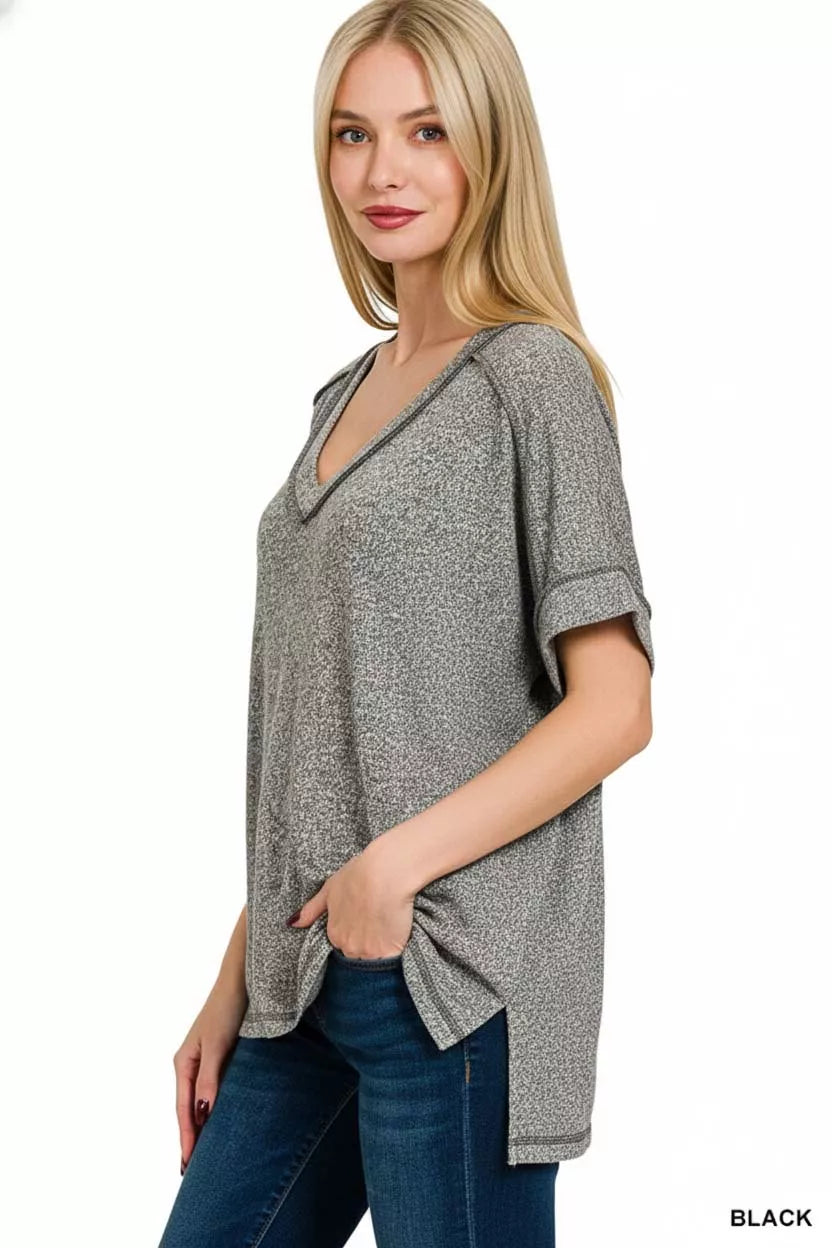 Melange hacci V-neck tee with exposed seams and hi-low hem
