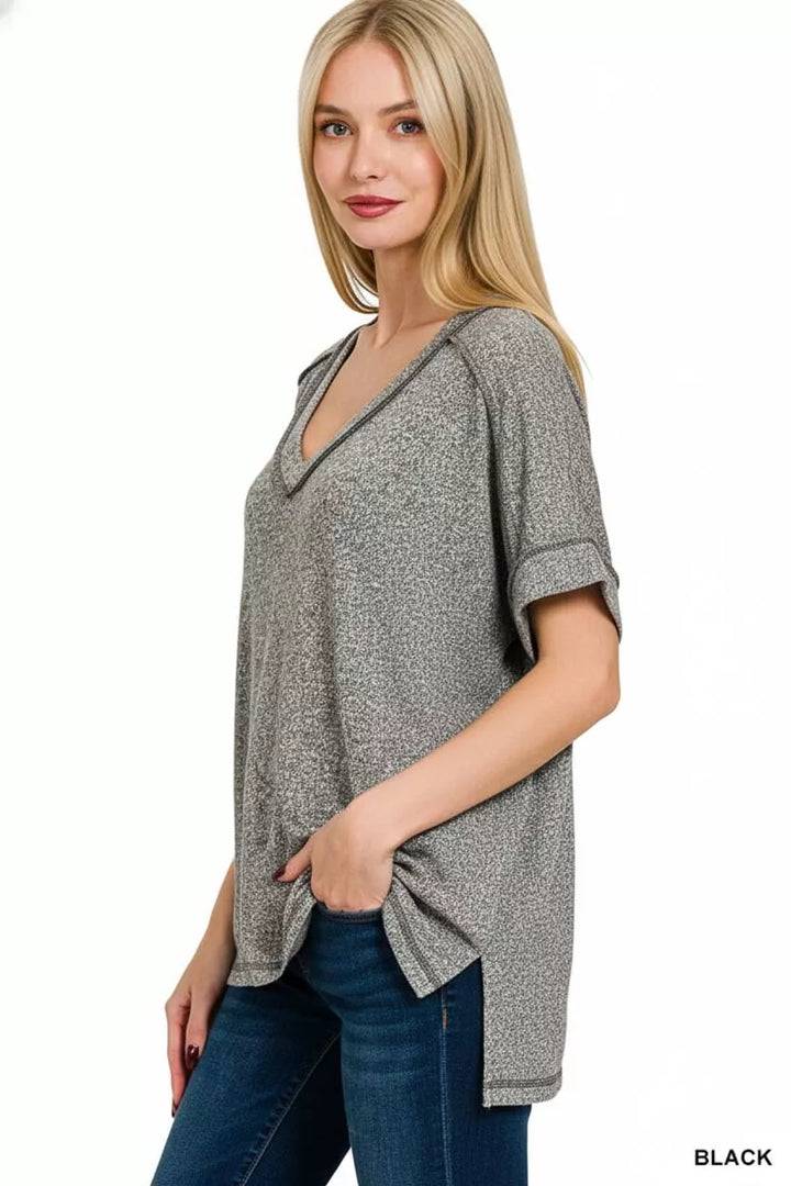 Melange hacci V-neck tee with exposed seams and hi-low hem