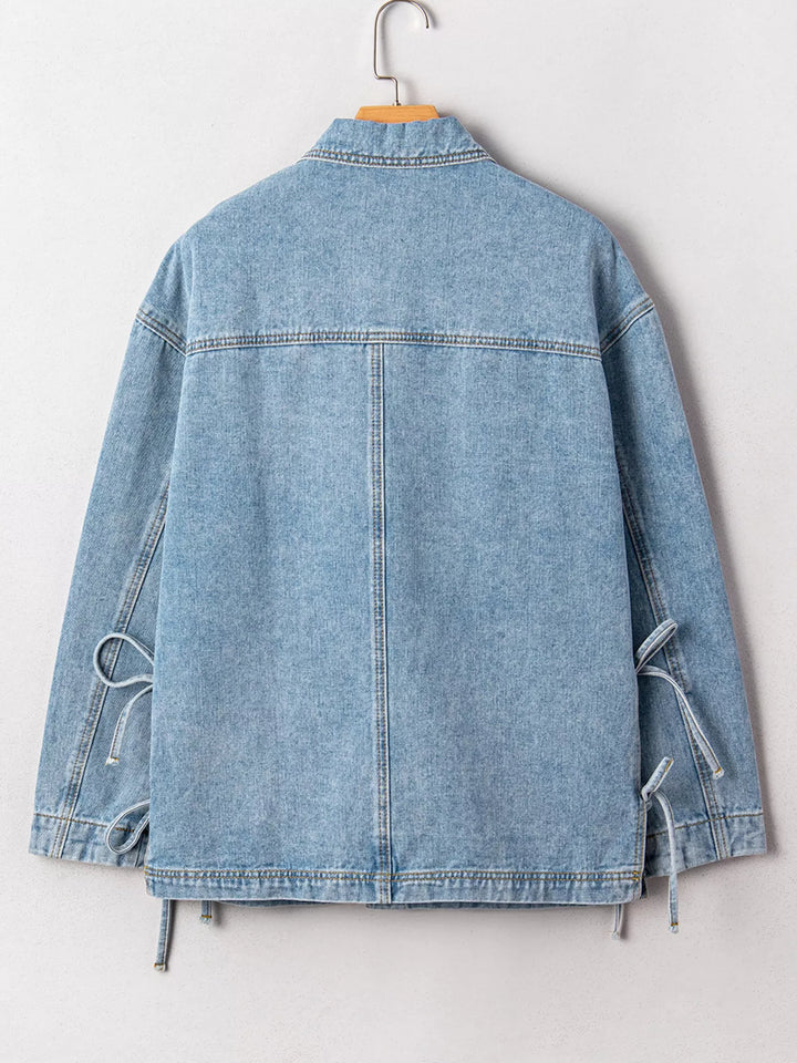 Oversized denim jacket with patch pockets and side ties