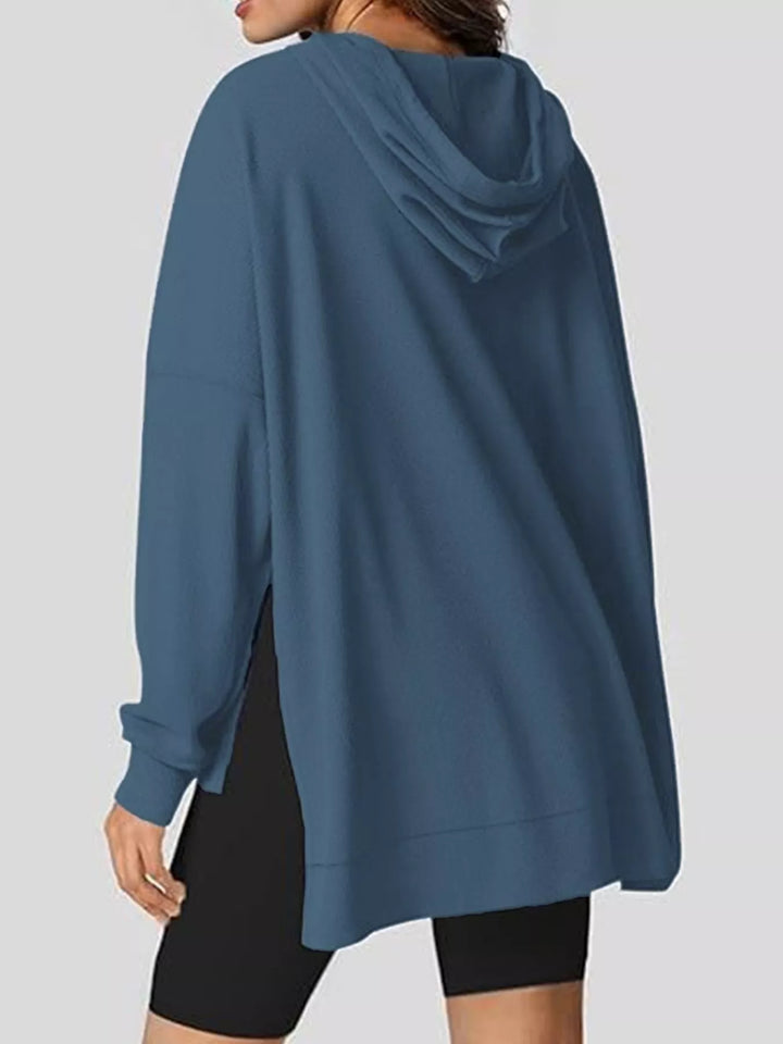 Oversized waffle-knit hoodie with side slits and front pocket