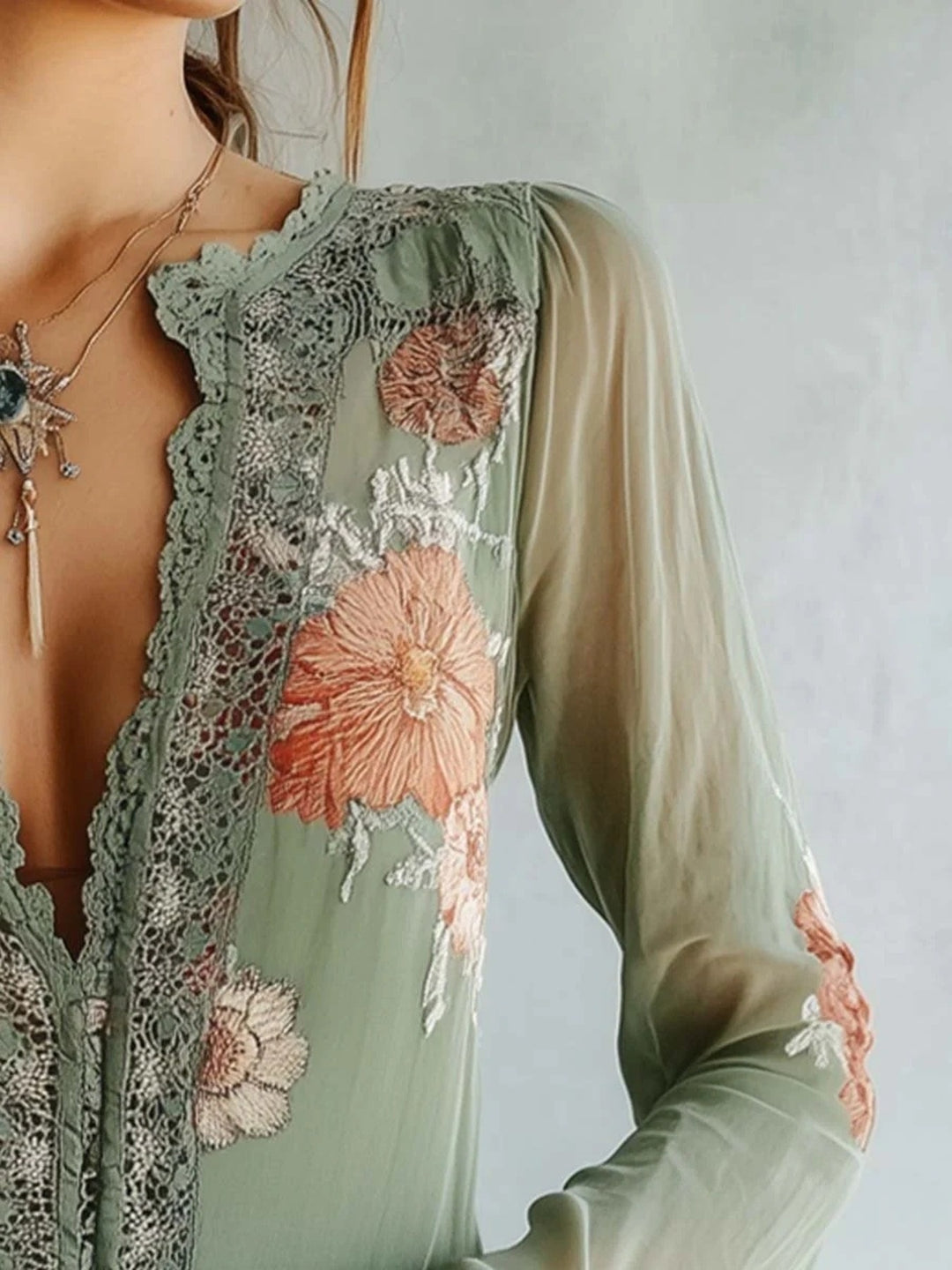 Floral embroidered lace trim blouse with plunge neckline