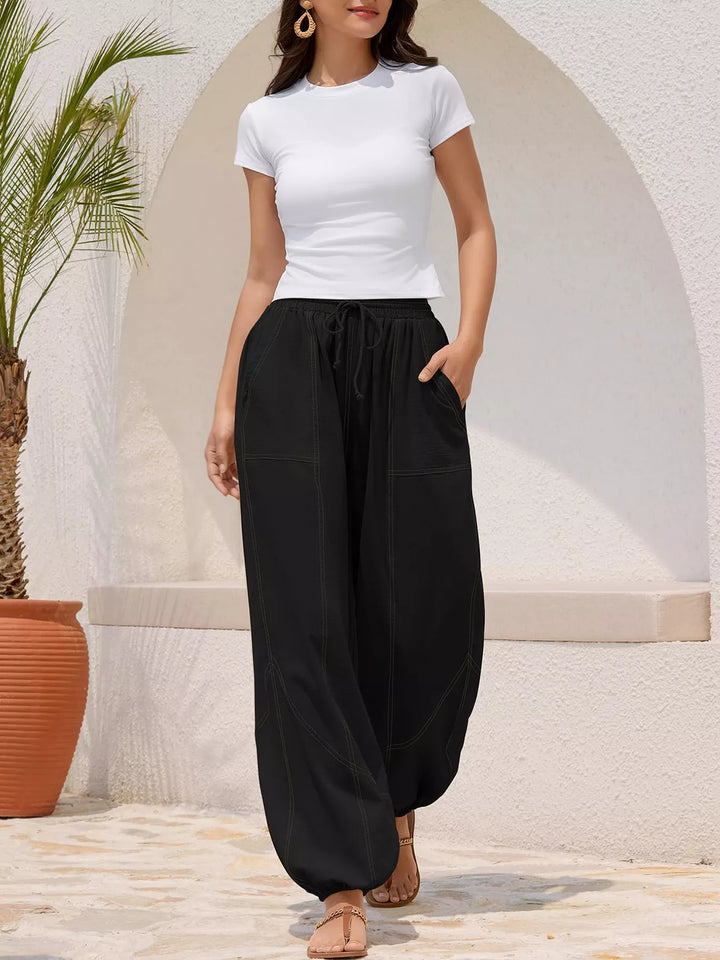 Drawstring waist wide-leg harem joggers with side pockets