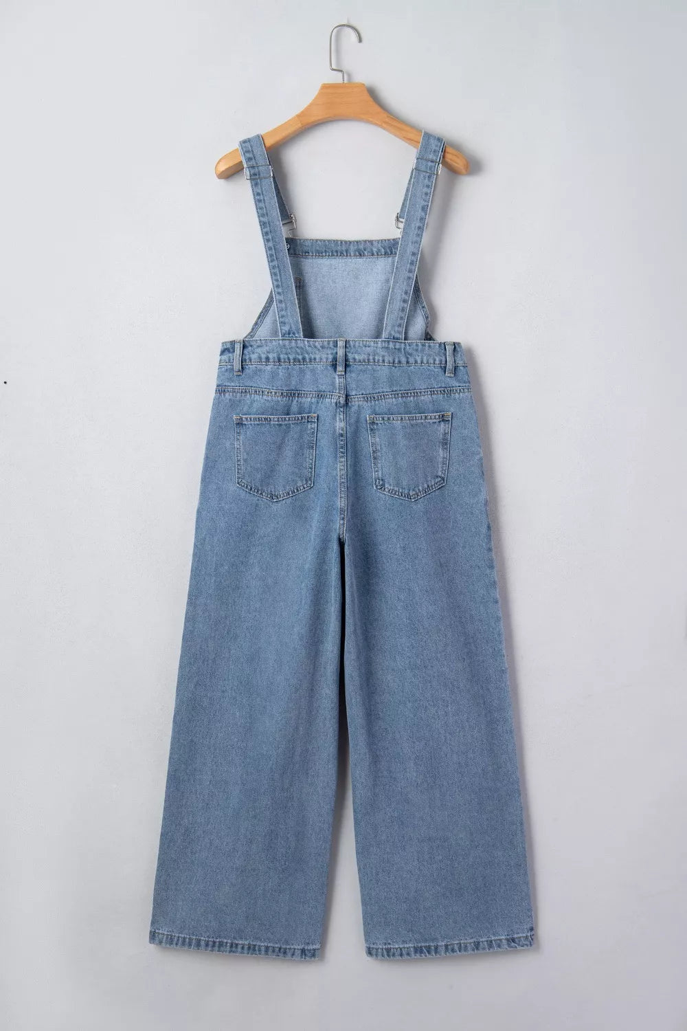 Pleated wide-leg denim overall jumpsuit with bib pocket