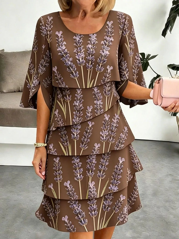 Tiered floral print midi dress with flutter sleeves