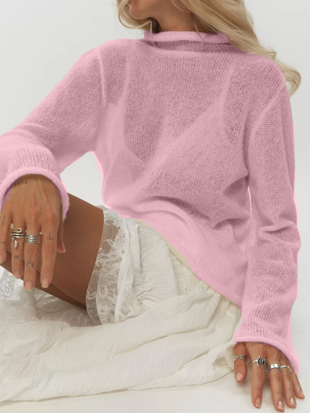 Pink Sheer open-knit mock neck sweater with long sleeves